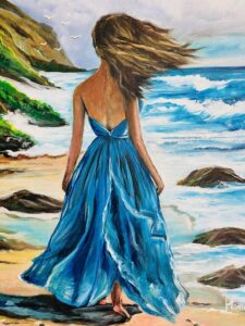 Frau in blauen Kleid steht am wilden Strand und schaut auf das Meer. Gemälde von Monira Art