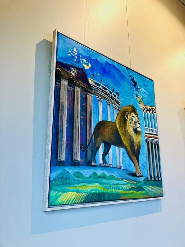 Lion painting framed on wall