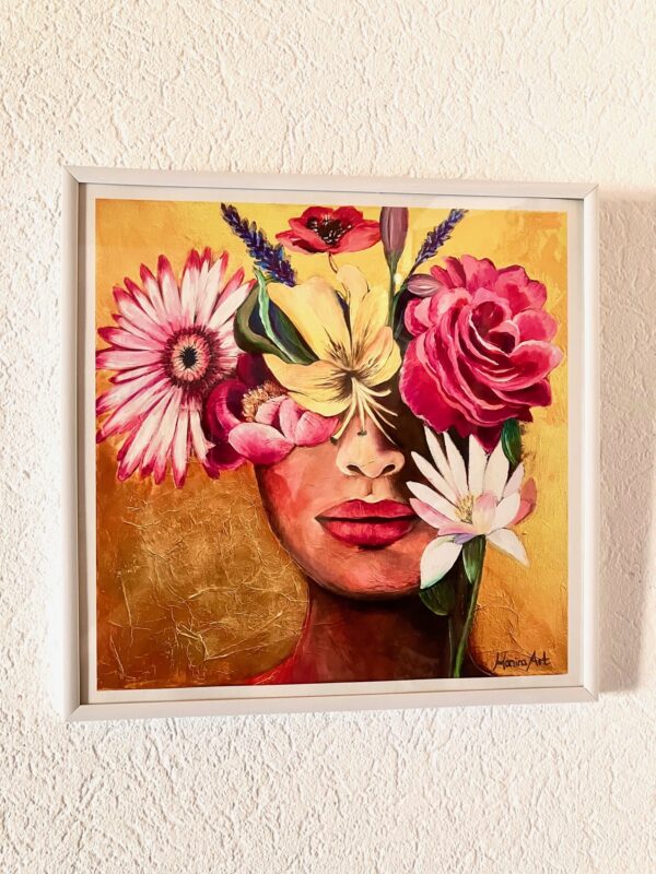 Bild eine Frau mit Blumen auf dem Kopf