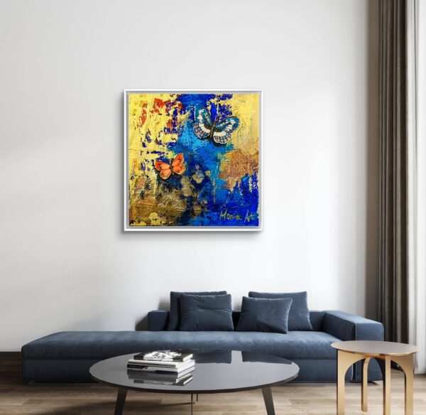 Butterfly painting over grey sofa